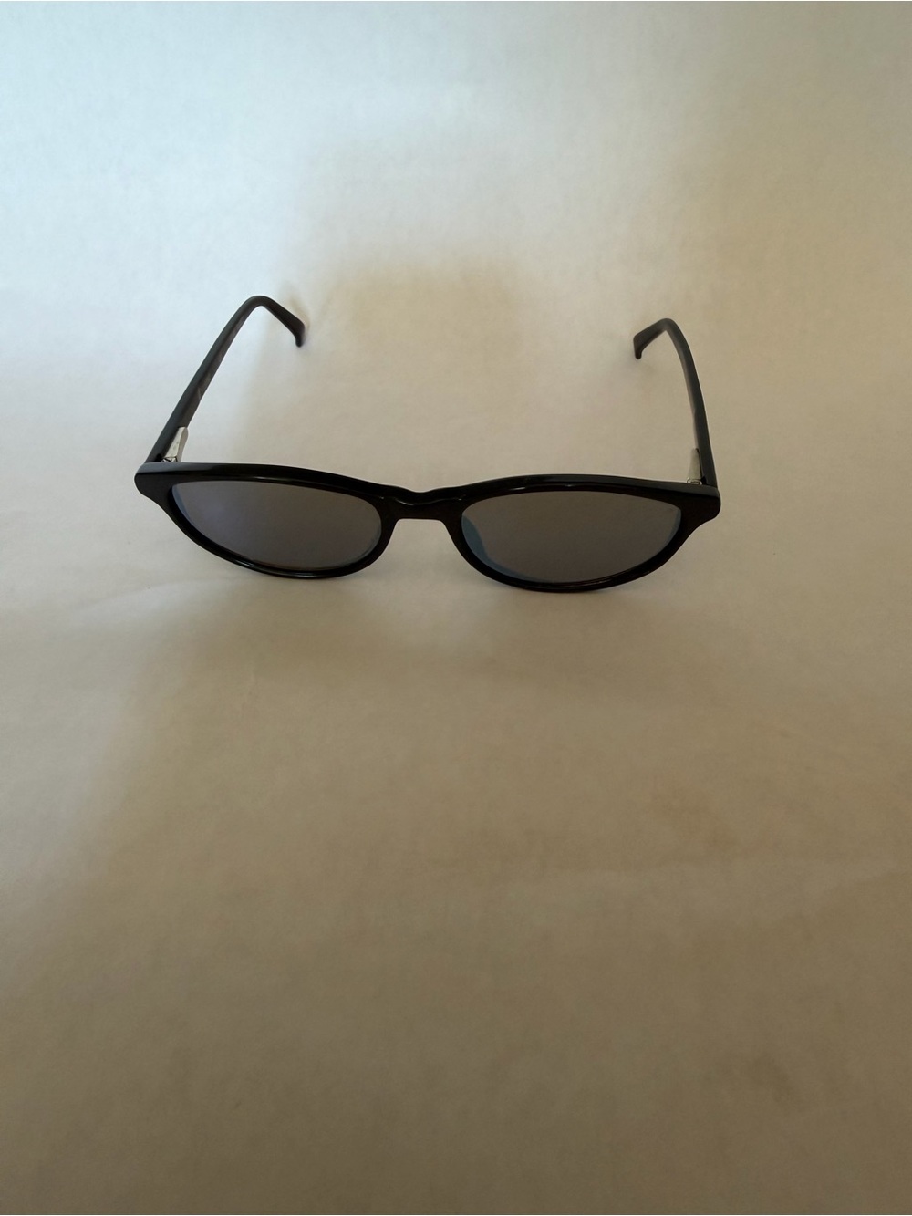 Revo Women’s Black Sunglasses with Dark Lenses